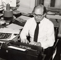 Robert Liebman typing on a typewriter